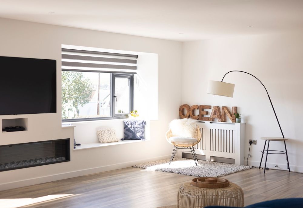 An interior photograph of an air b&b near the sea in the lounge.