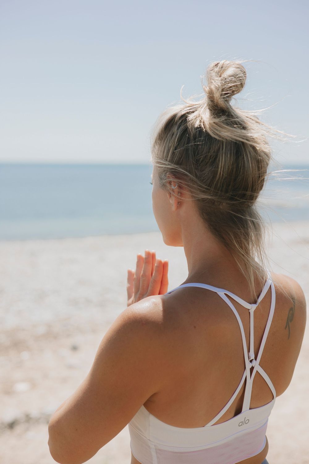 Brand photograph of a woman taken on the beach  in Lyme Regis - DORSET