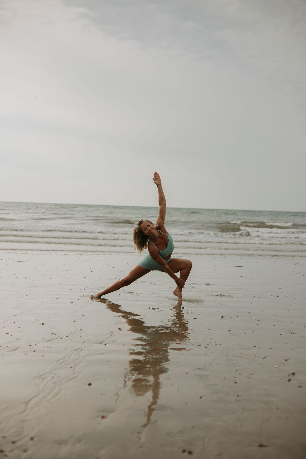 Brand photograph of a woman taken on the beach  in Lyme Regis - DORSET