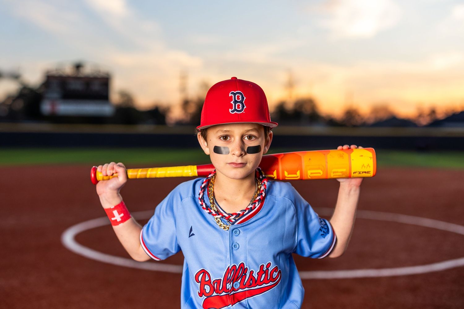 Youth baseball portrait using off-camera flash during a team media day in Lake Charles, LA. Ballistics at Westlake High School Field