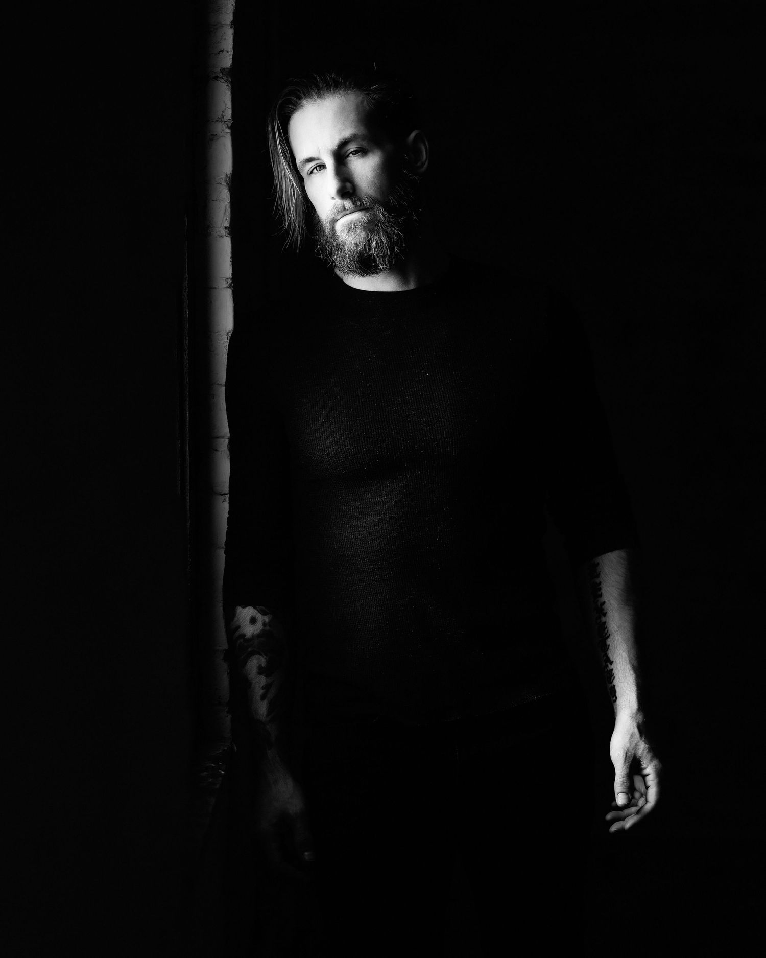 David G Holt Photography - Moody low-key portrait with dramatic shadows and lighting.