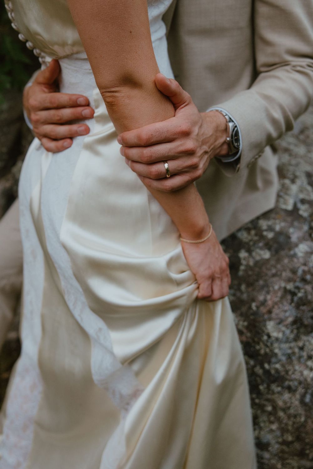 Intimate portrait of bride in vintage silk satin, and groom. Howdy Pictures - film wedding & elopement photographers in Canada & New Zealand