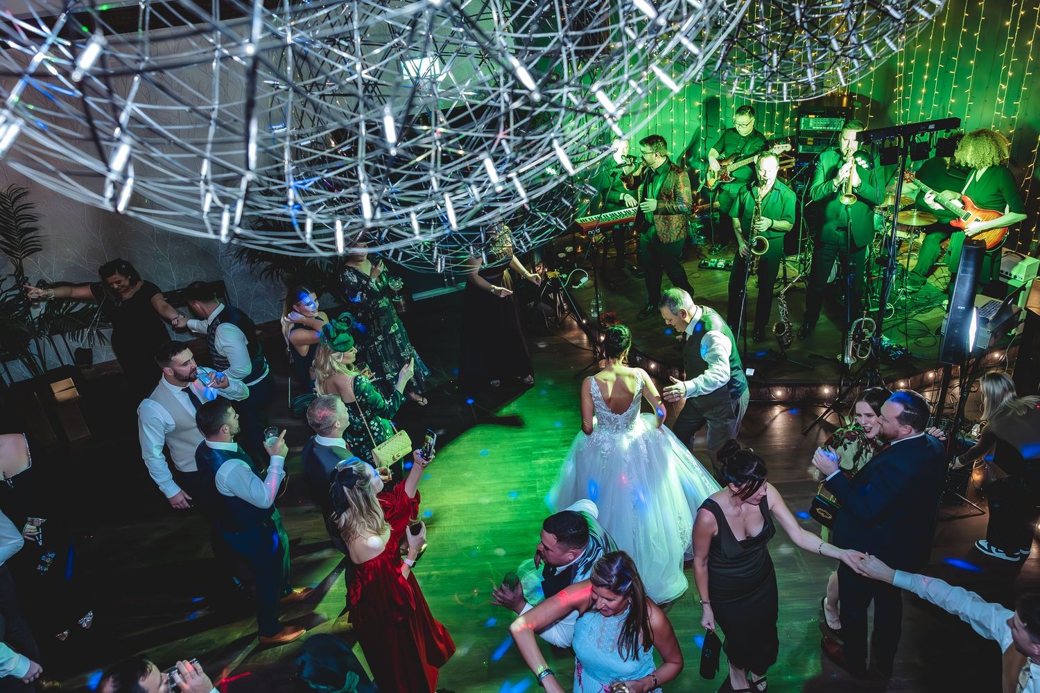 Documentary wedding photography capturing evening celebrations.