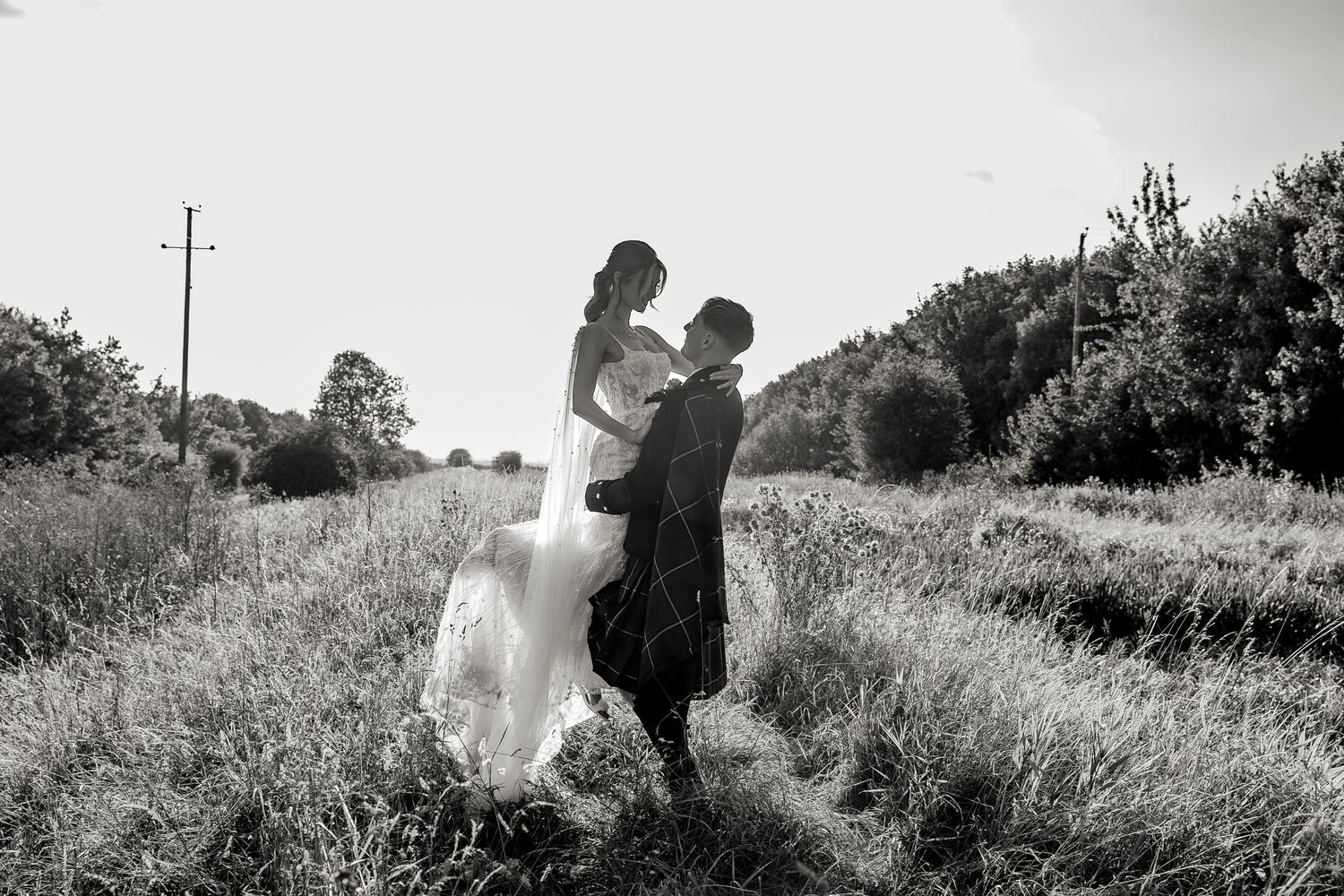 Unobtrusive documentary wedding photography during couple portraits.