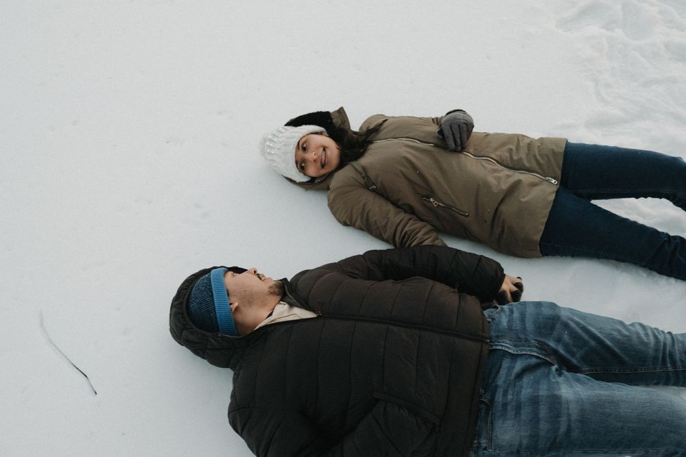 A sequence of six images showing someone lying down and rolling over on a white background.