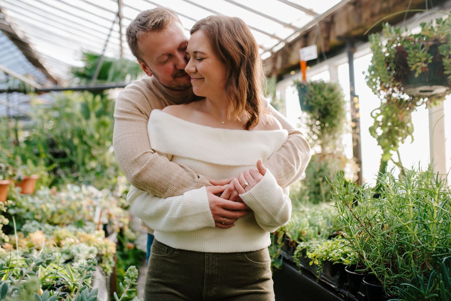 Greenhouse engagement session in Wichita, KS - Plant Kingdom engagement pictures by Jessica Nadine Photography