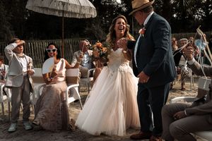 A series of candid moments from a rustic outdoor wedding celebration showing dancing and joyful interactions.