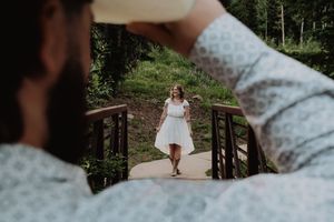 man watching a girl dancing in the distance