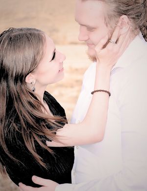 male and female gazing at each other with admiration