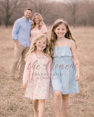 Lifestyle family session with kids leading and parents in soft background
