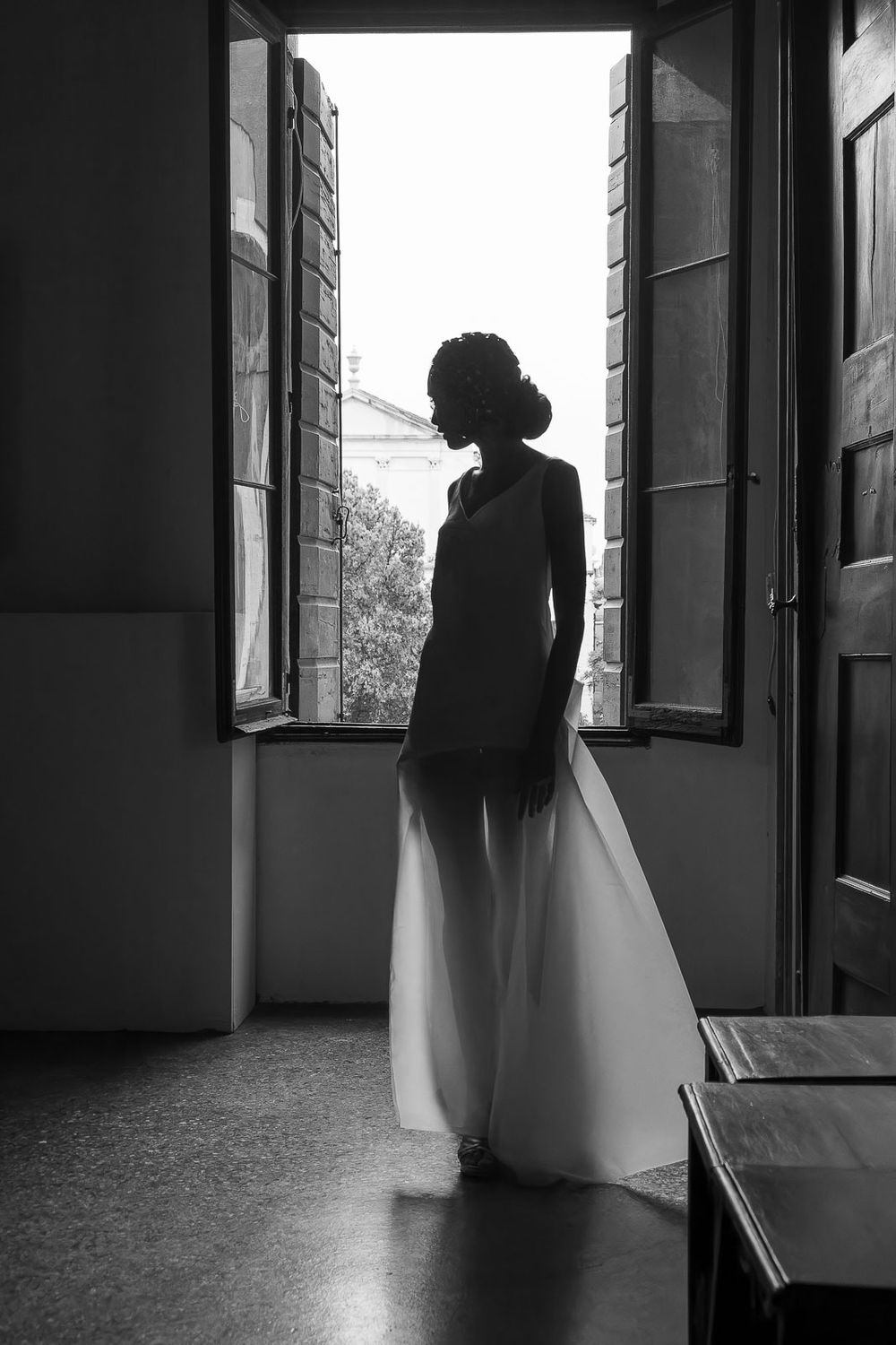 Editorial shot of bride in historic town house in black and white