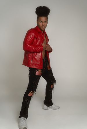 Charleston modern fashion portrait of male model in red jacket with creative lighting