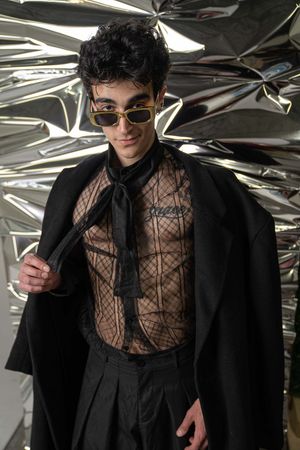 Charleston editorial men’s portrait with metallic background and high fashion styling