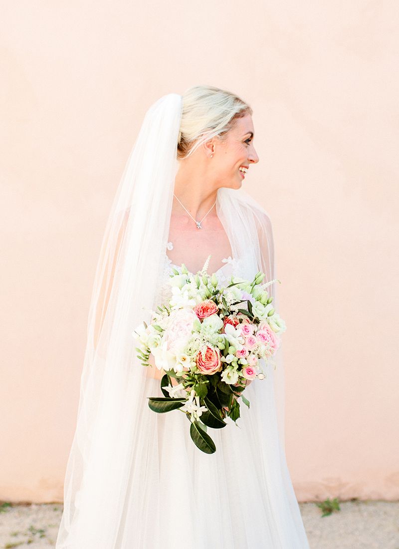 Bride portrait with bouquet at Château de Massillan wedding in Provence