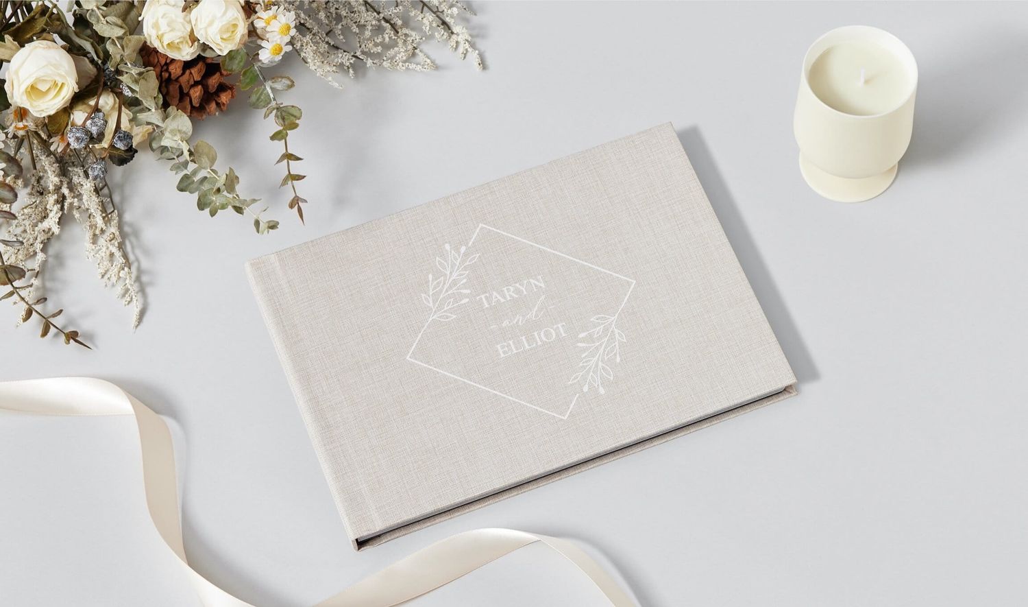 an elegant wedding album with a linen textured album cover