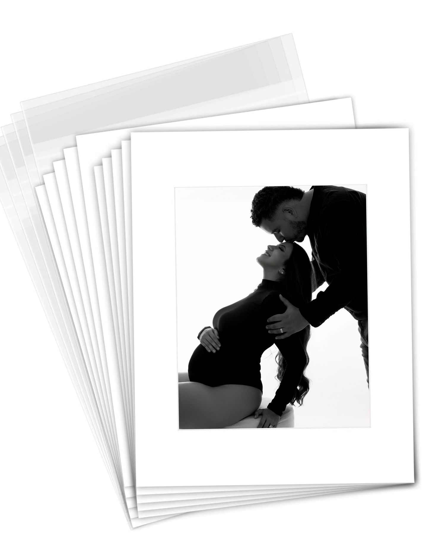 A series of white paper stacks arranged in a diagonal pattern with silhouetted figures on some pages.