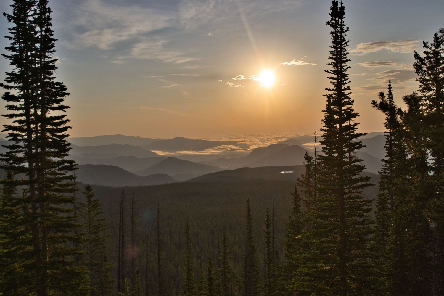 Bierstadt Lake and inversion clouds taken from the flattop mountain trail in rocky mountain national park.