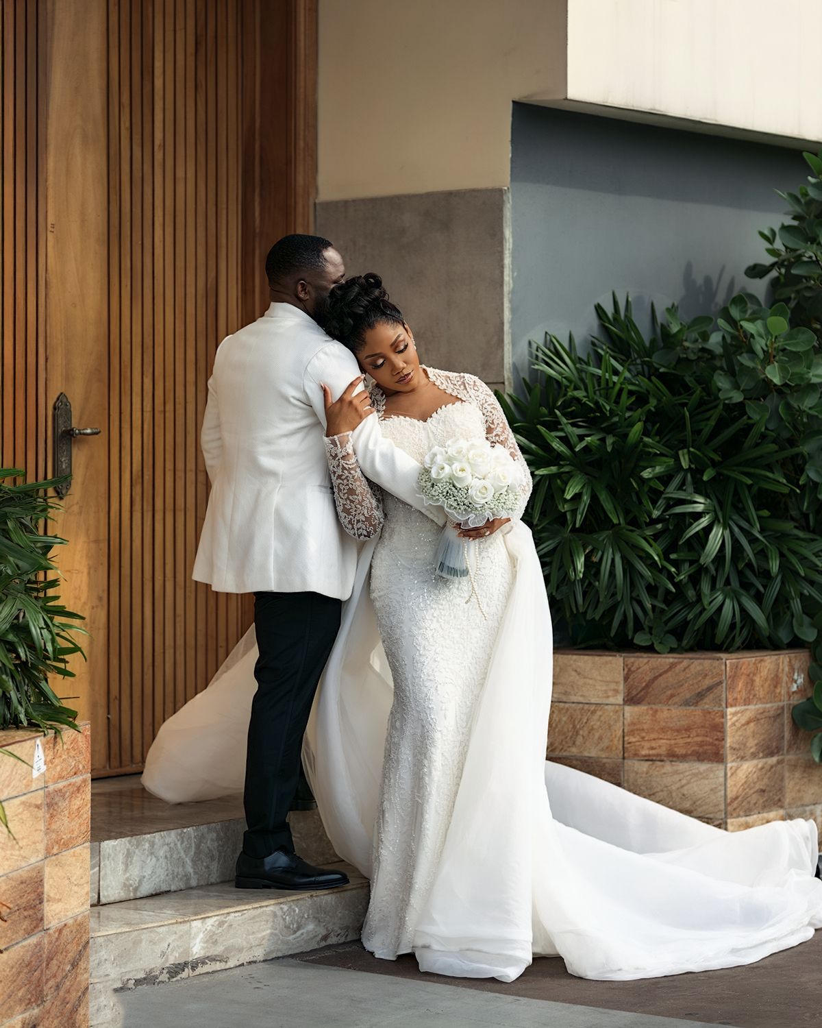 Romantic wedding portrait captured by Roy Ayomide Studios with timeless storytelling and elegant composition.