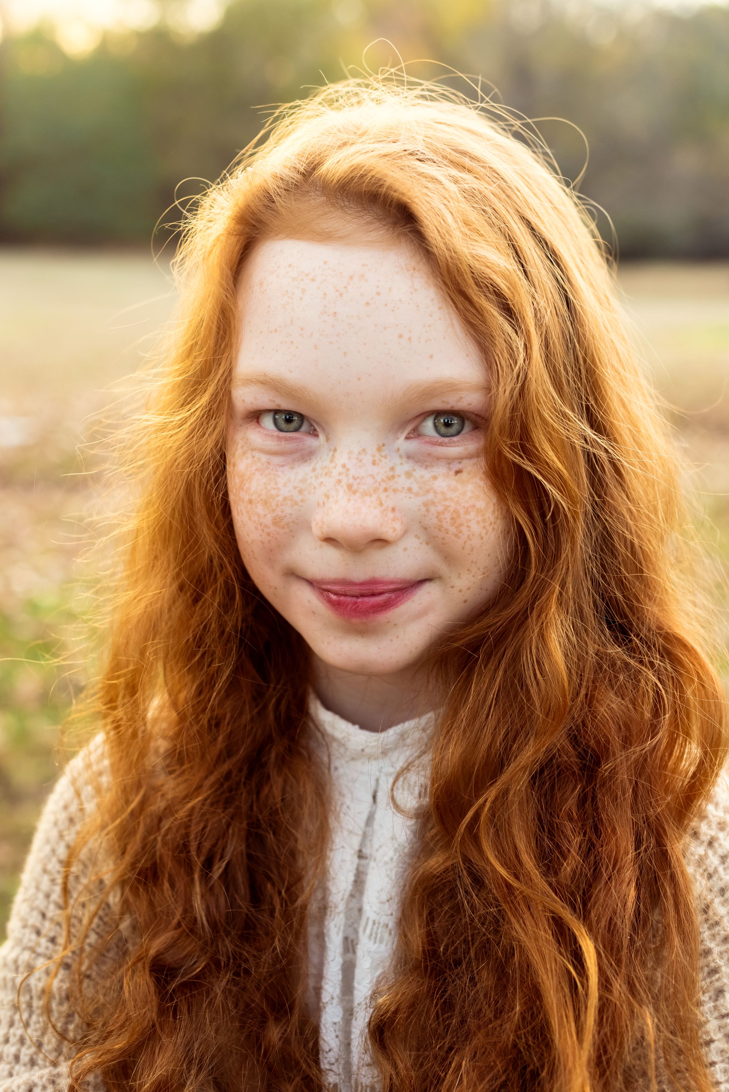 Memphis Family Portrait at Shelby Farms with redhead girl during Golden Hour.