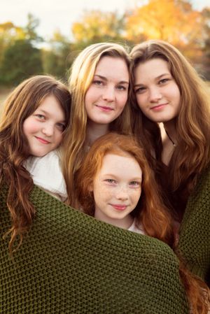 Memphis Family Portrait at Shelby Farms with four daughters during Golden Hour.