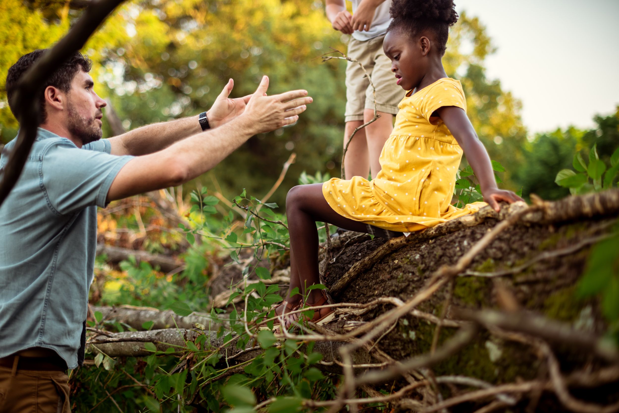 Memphis Family Photographer portrait of father and daughter at Shelby Farms during Golden Hour.