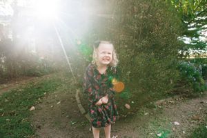 Memphis Family Photographer portrait of toddler girl excited and joyful.