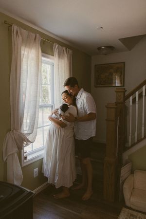 Four sequential images showing someone in a white shirt looking out through sheer curtained windows in a sunlit room.