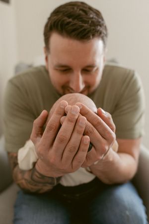 A person in gray clothing covers their face with their hands in a series of sequential photos showing emotional distress.