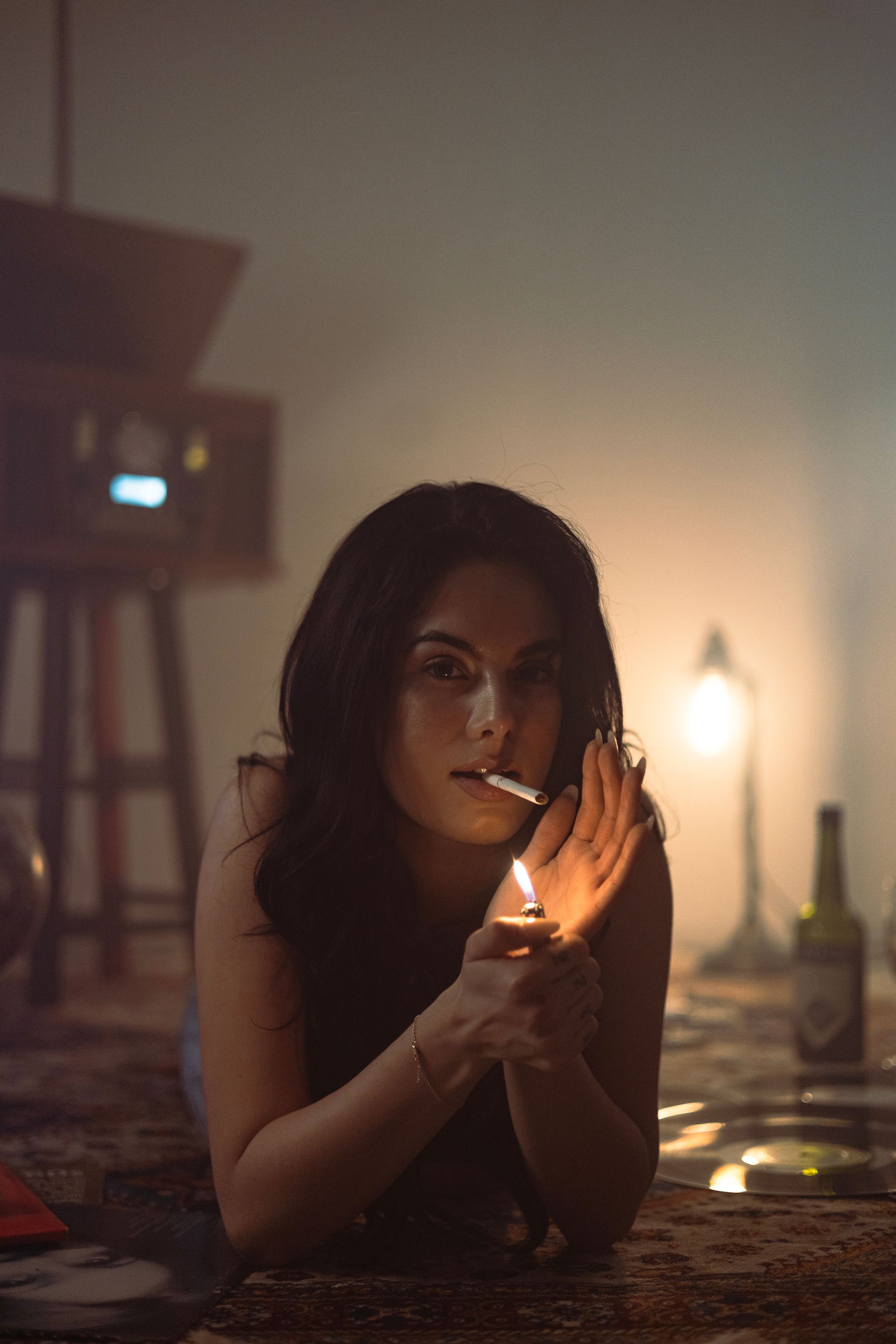 Moody cinematic close-up in candlelight, editorial style for actors and musicians, inspired by Billie Eilish aesthetics. MannyPortraits.