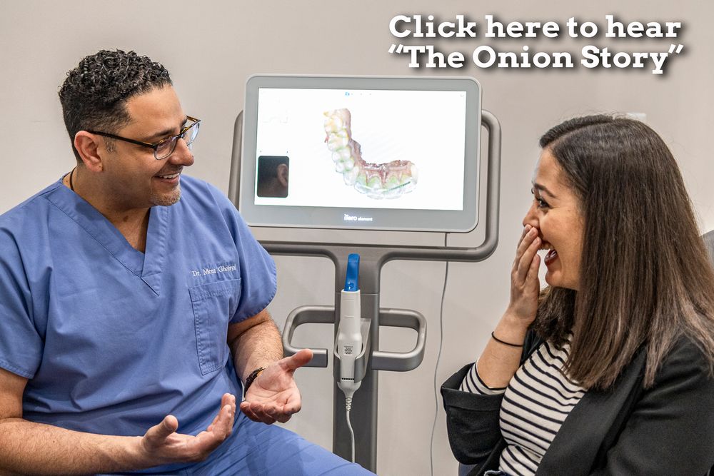 Medical staff members engage in friendly conversation in a clinical setting.