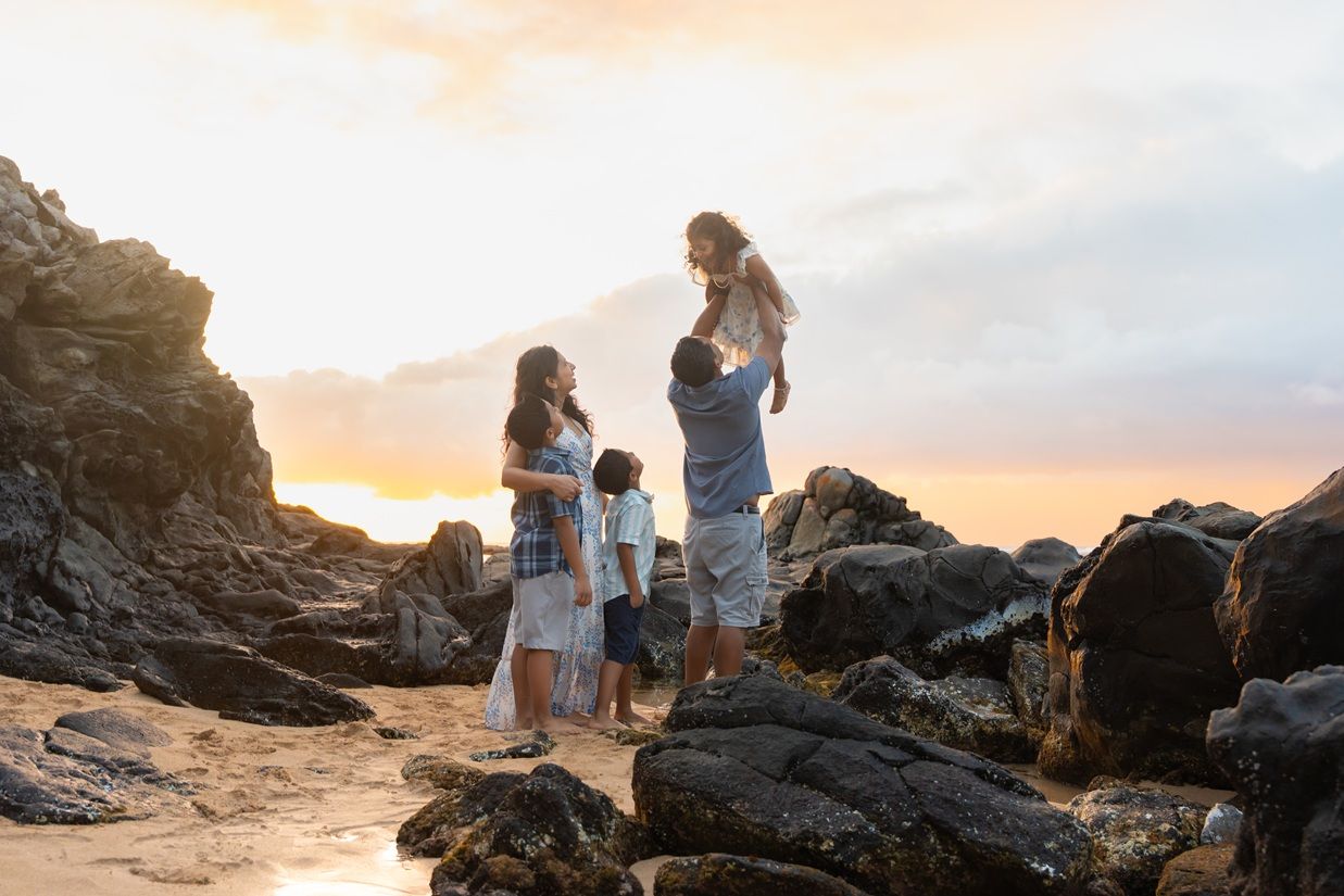 Maui family photographer photo against beautiful Maui sunset beach by ohwowfotos.