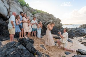 Maui family photographer photo against beautiful Maui sunset beach by ohwowfotos.