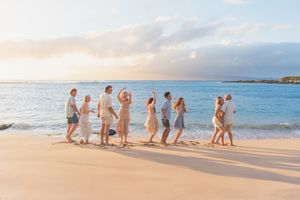 Maui family photographer photo against beautiful Maui sunset beach by ohwowfotos.