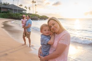 Maui family photographer photo against beautiful Maui sunset beach by ohwowfotos.