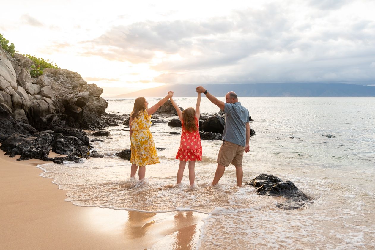 Maui family photographer photo against beautiful Maui sunset beach by ohwowfotos.
