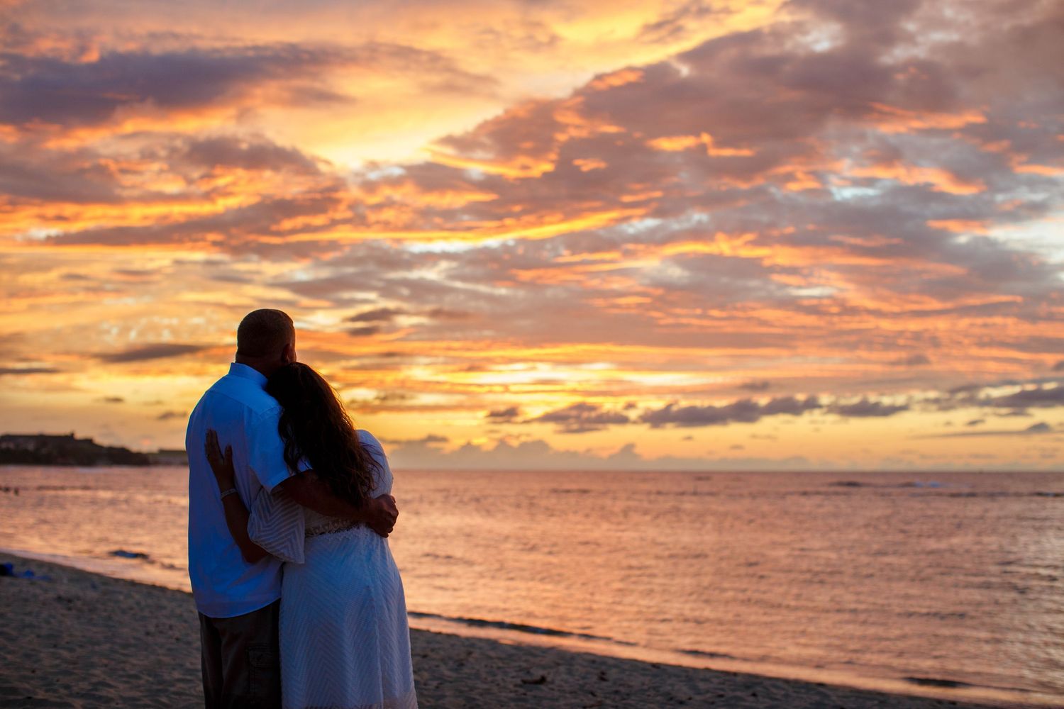 Elopement on the beach at Balneario del Escambrón in Old San Juan, Puerto Rico. Couples portrait - bride and groom.