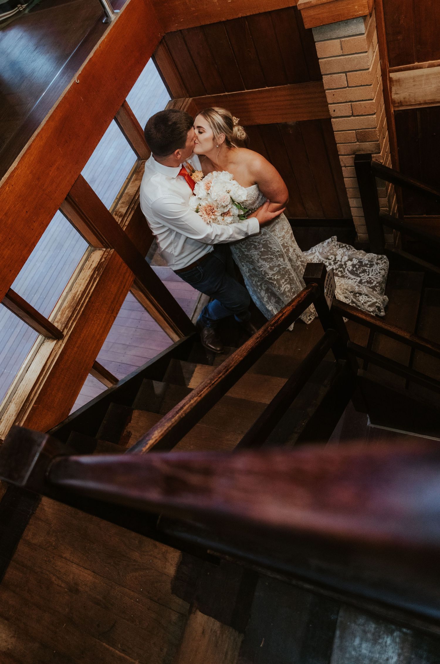 Romantic dance sequence captured in wooden interior with dramatic lighting.