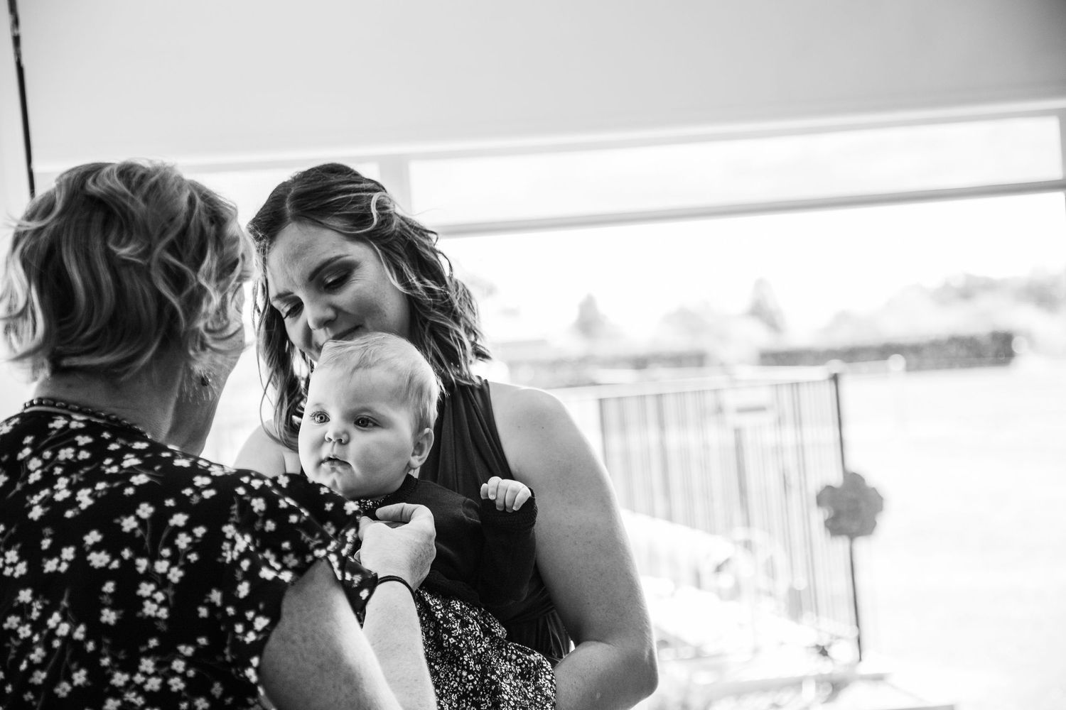 Black and white wedding detail shots capturing intimate moments between a couple.