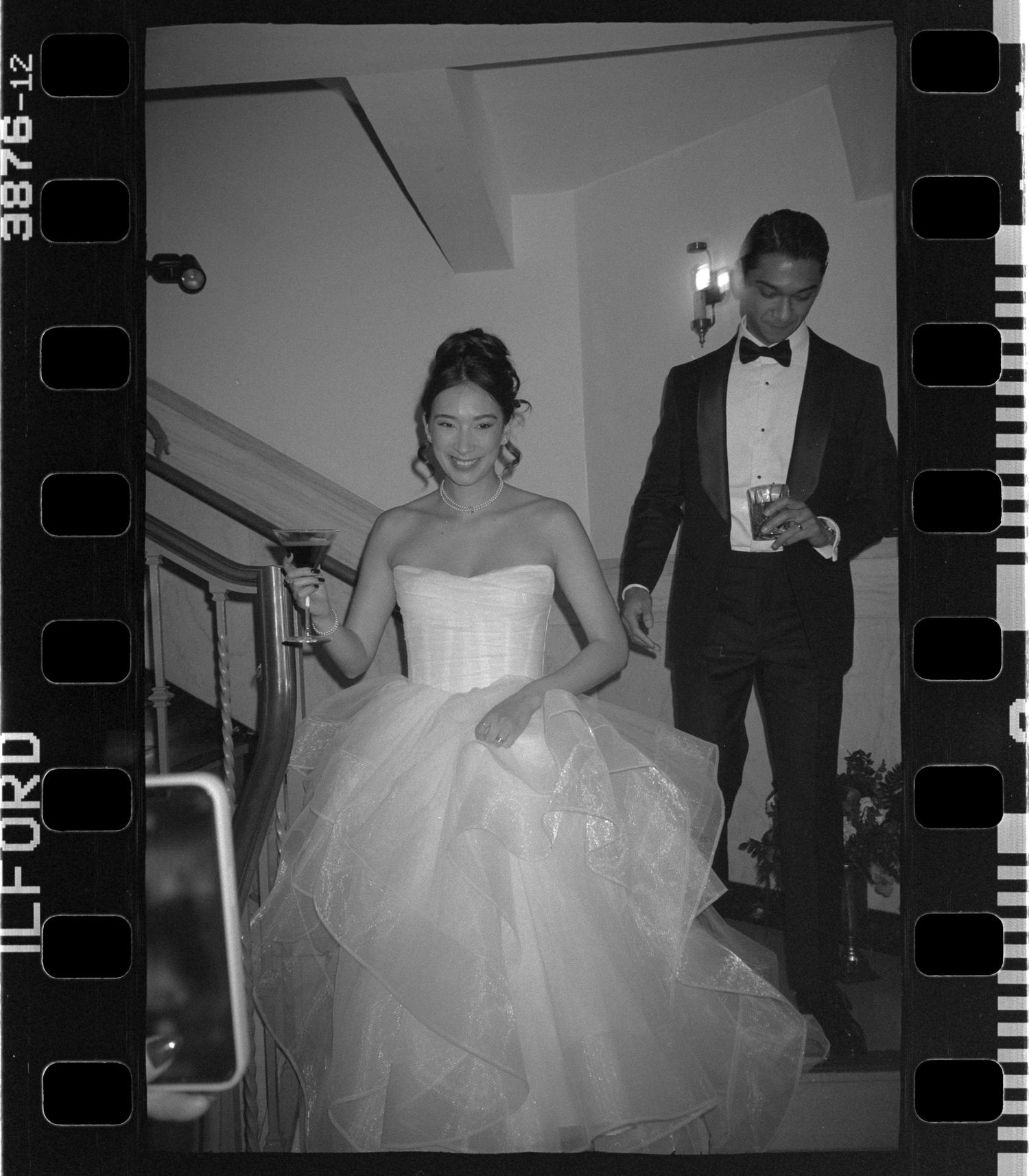 Vintage film strip showing moments from a wedding celebration. Black and white 35mm film at a Allentown, PA wedding
