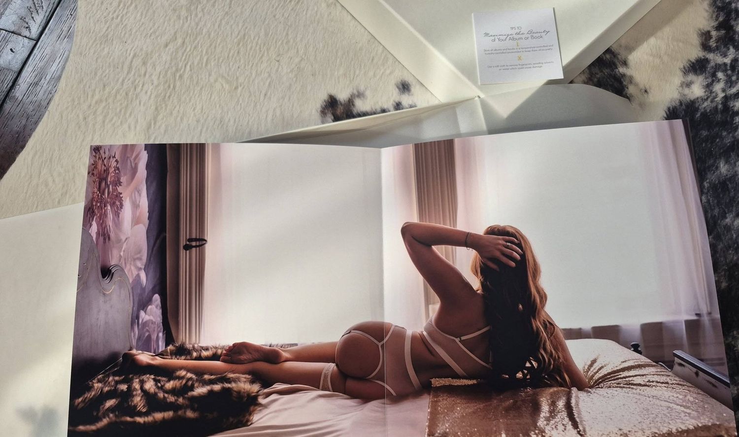 The inside of a boudoir album.