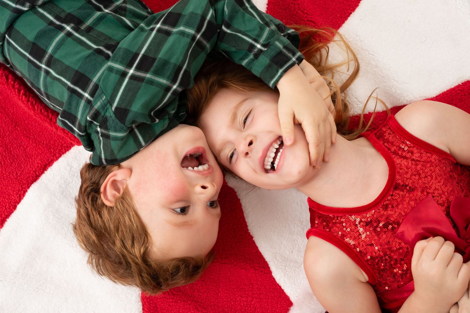 Holiday themed photos with red and green outfits showing joyful expressions.