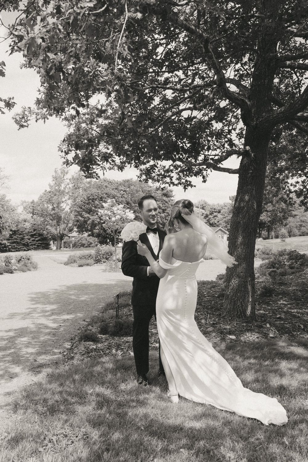 First look on the grounds of Government House during a downtown St. John's wedding captured by wedding photographer Kaitlyn Yvette