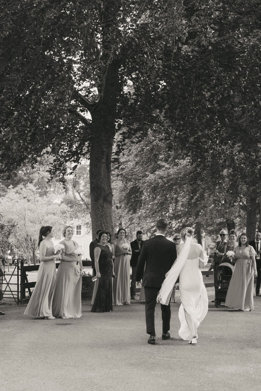 Candid family photos on the grounds of Government House during a downtown St. John's wedding captured by wedding photographer Kaitlyn Yvette