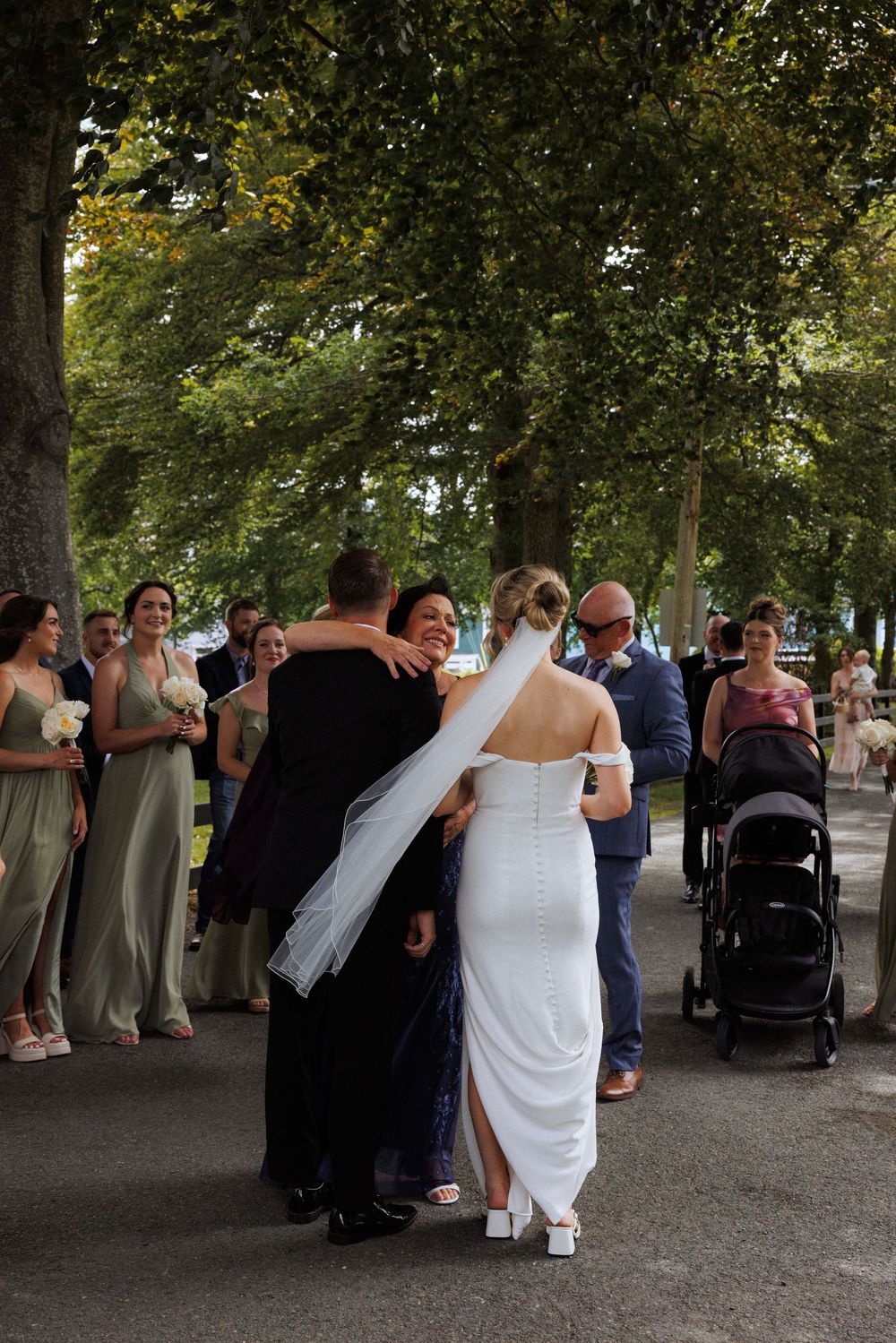 Candid family photos on the grounds of Government House during a downtown St. John's wedding captured by wedding photographer Kaitlyn Yvette