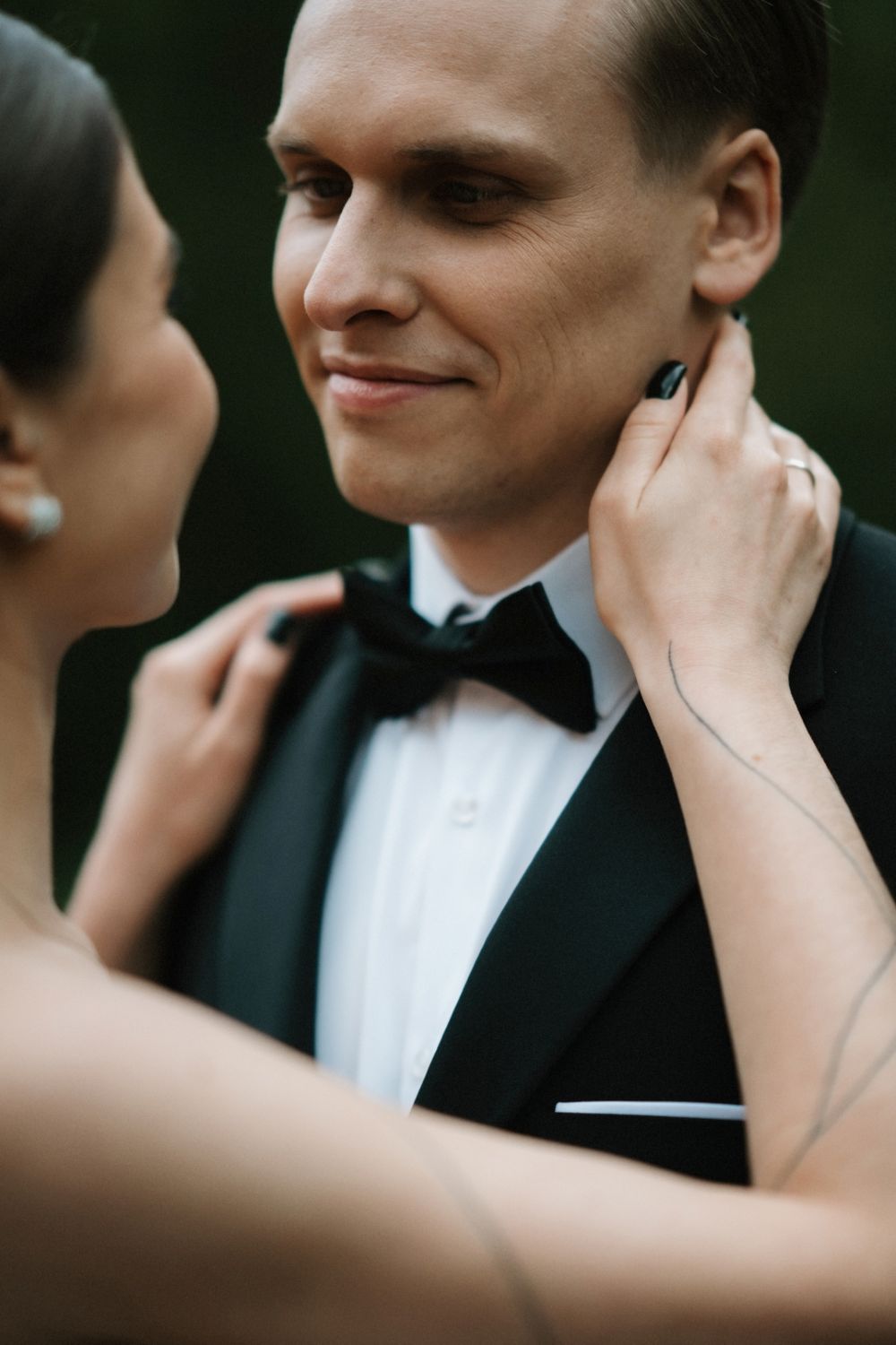 Close-up sequence of tender moments between newlyweds in formal wedding attire.