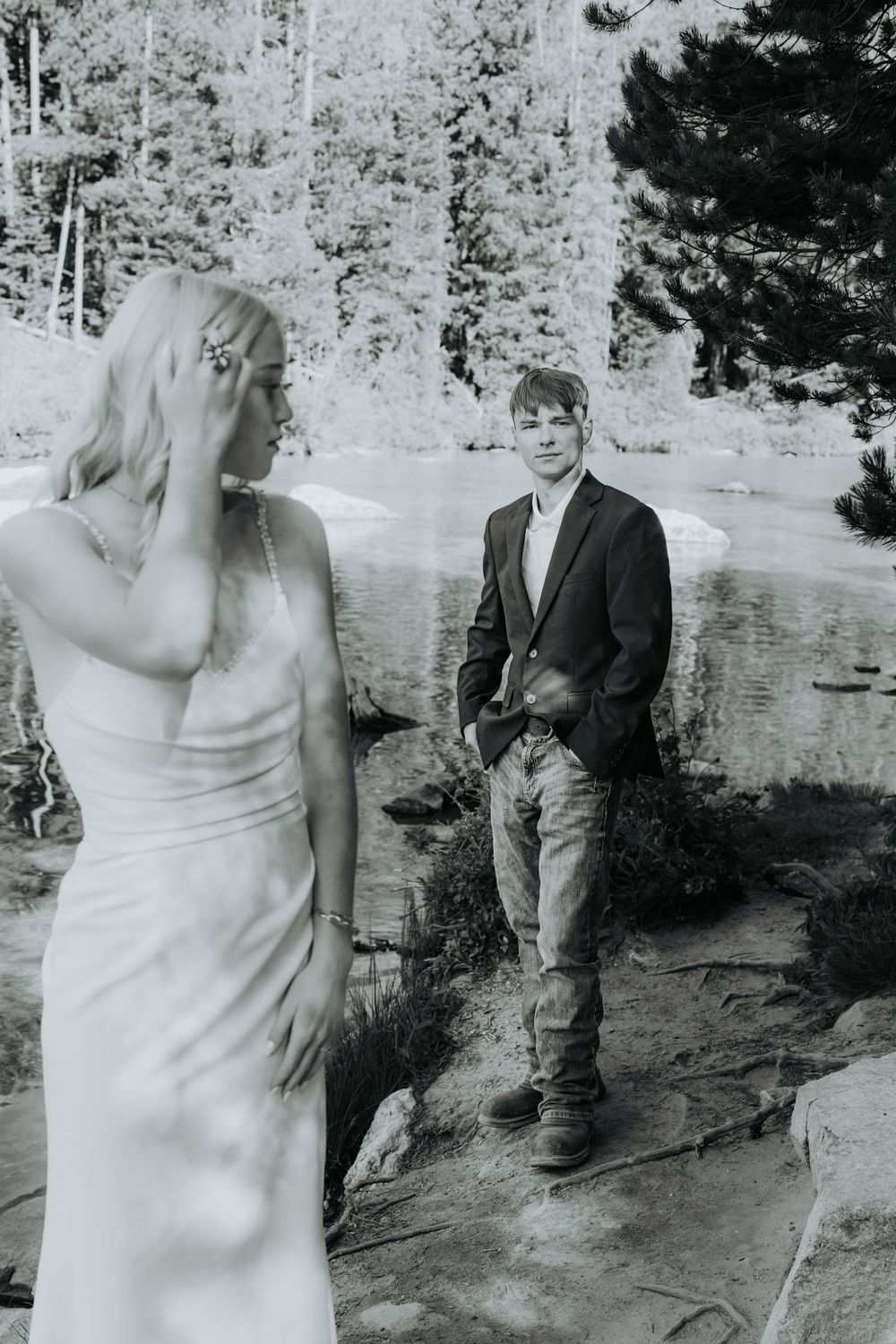 Series of black and white wedding photos showing a couple posing candidly outdoors near a rocky landscape.