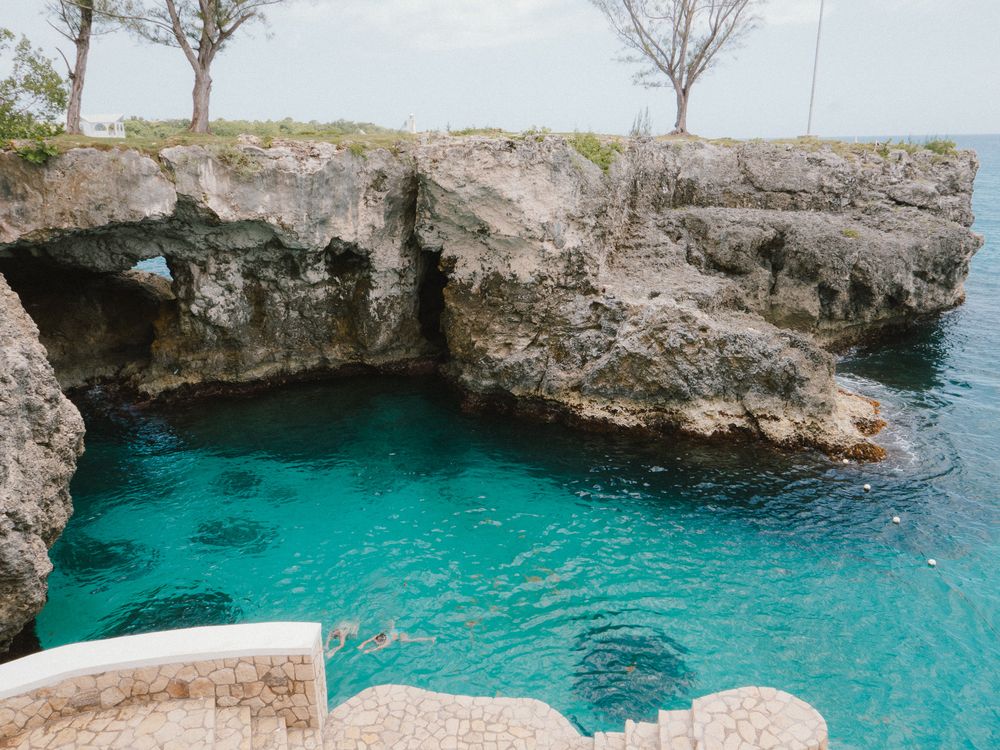 Beautiful turquoise coastal lagoon with limestone cliffs and crystal clear waters in Negril, Jamaica.