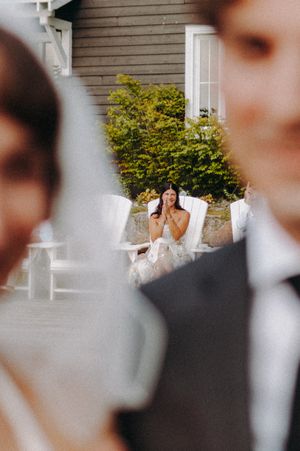 An artistic blurred wedding ceremony shot with selective focus.