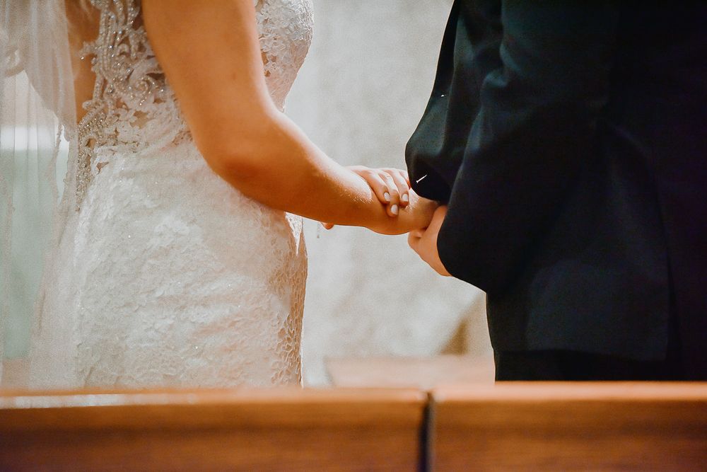 Five cropped photos showing closeup details of elegant wedding day moments in soft romantic lighting.