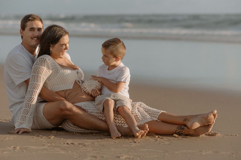 Sunrise golden hour Maternity photography session at Mudjima beach on the Sunshine Coast.